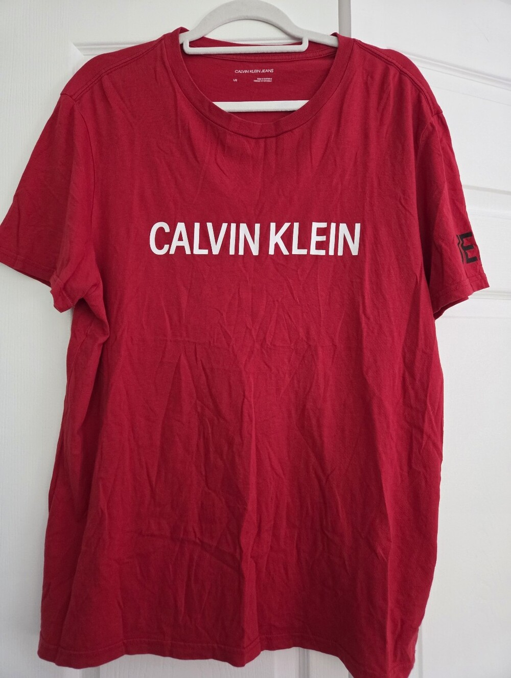 Calvin Klein Jeans short-sleeve logo T-shirt in red, size Large.